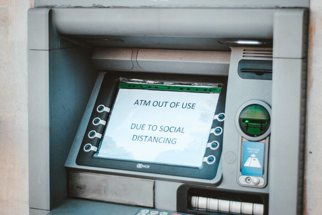 ATM that says "ATM out of use due to social distancing"